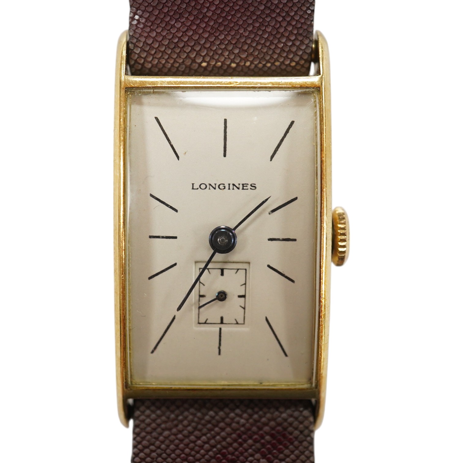 A gentleman's 14k gold Longines manual wind wrist watch, with rectangular dial, baton numerals and subsidiary seconds, case diameter 20mm, on a later associated strap. Condition - fair